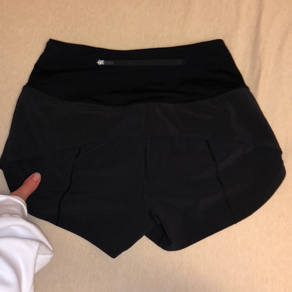lululemon black speed ups! size 2 high waist 2inch shorts! worn literally once:)